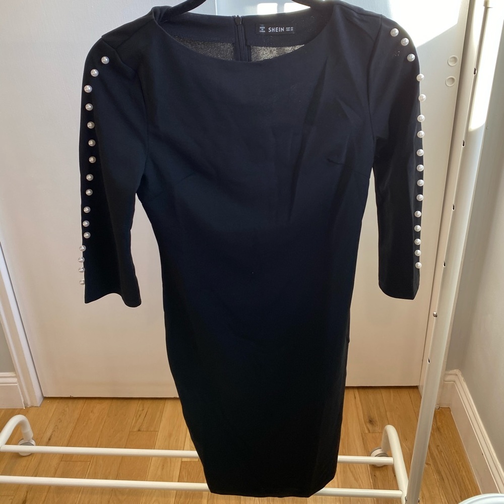 Black dress with pearl sleeve